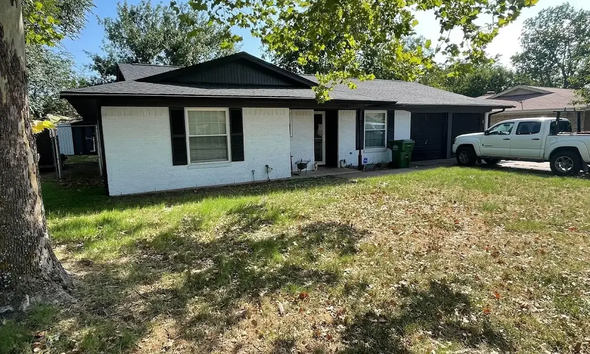 Professional roofing crew working on a residential roof in Blythewood